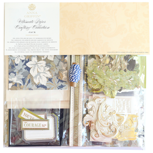 Jack Ultimate Paper Crafting Collection kit, ideal for scrapbooking and card making, includes floral patterned papers, die-cut embellishments, tags, ribbon, and blue-striped twine in a clear package.
