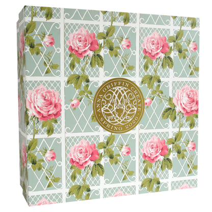 Square decorative box with pink and green lattice and rose floral pattern, featuring a gold "Anna Griffin | Create Spring 2026" seal—perfect for storing keepsakes from papercrafting events or online crafting classes.