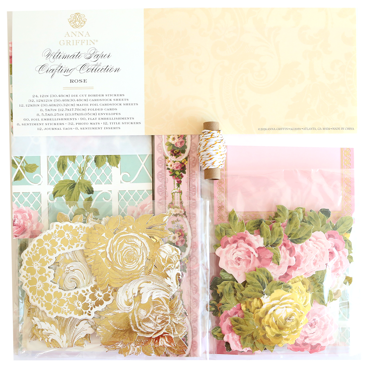 The Rose Ultimate Paper Crafting Collection includes gold floral stickers, pink and yellow paper flowers, twine, and patterned papers in a clear package—ideal for scrapbooking and card making.