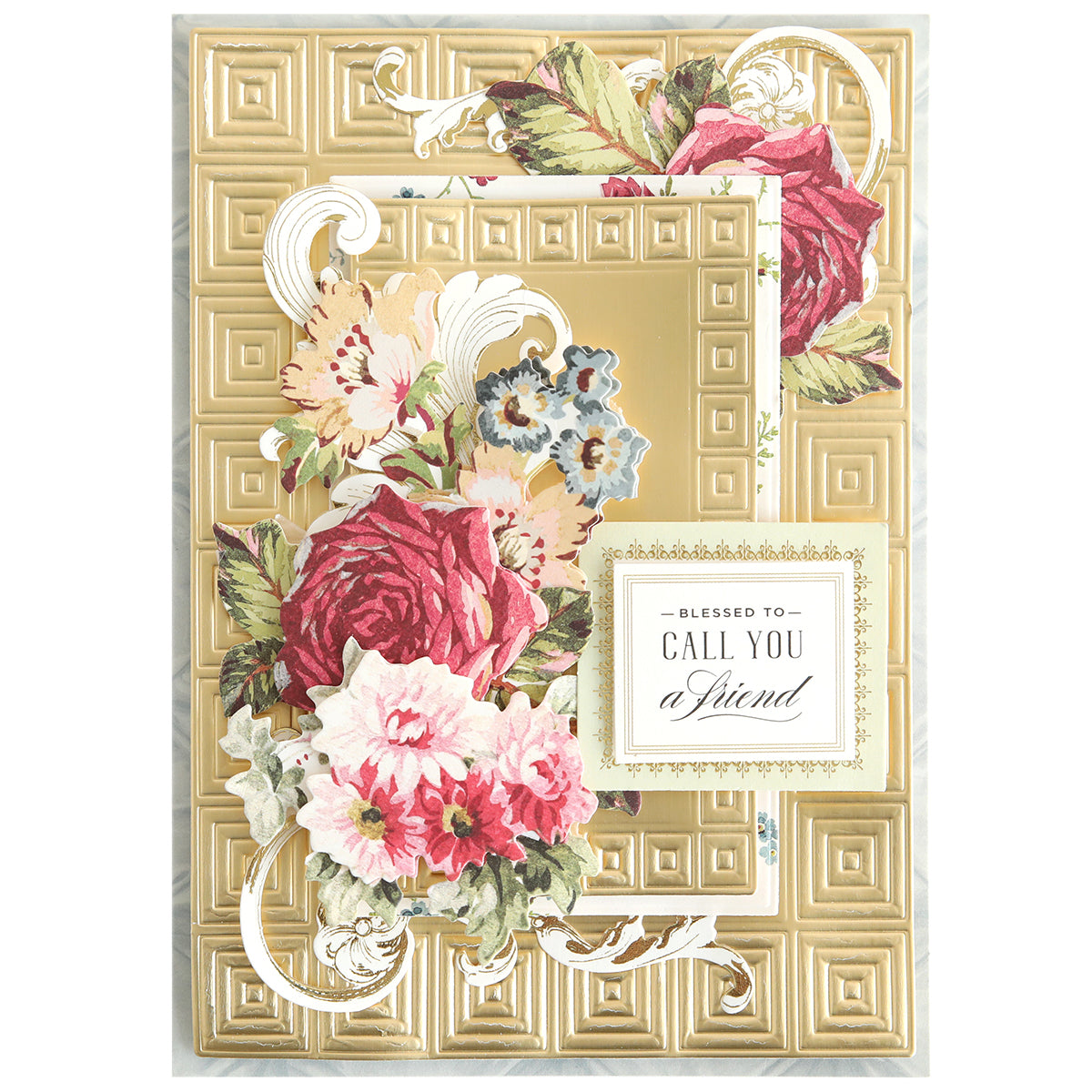 A decorative greeting card featuring gold embossed geometric patterns, floral cutouts made with Create Spring Frame Dies, and a heartfelt message: “Blessed to call you a friend.”.