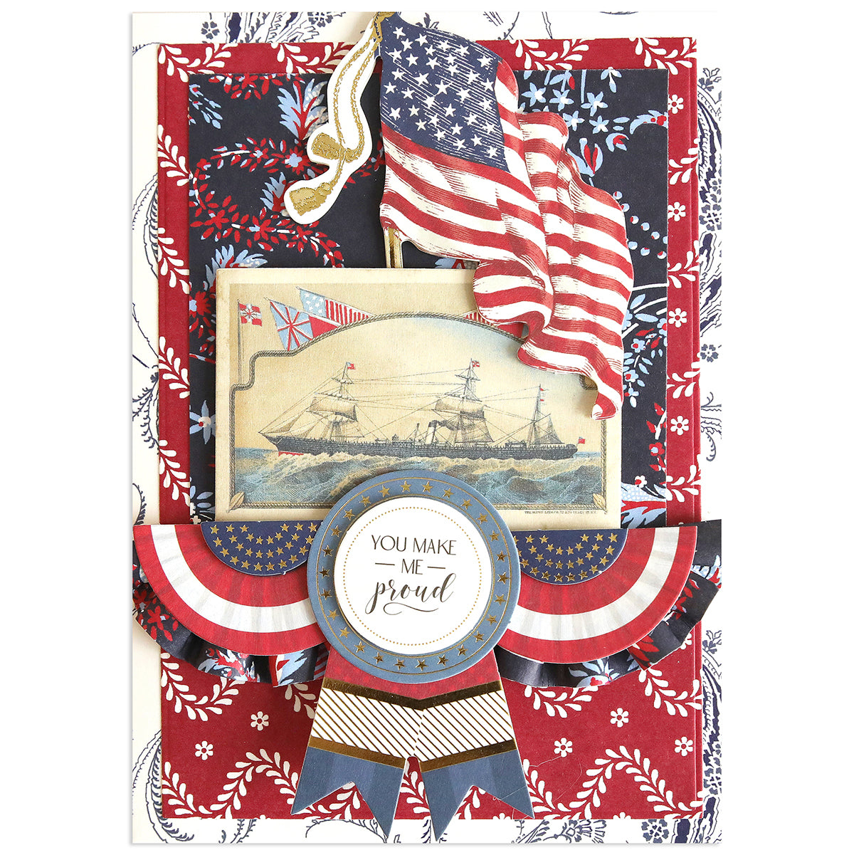 Handmade patriotic card with American flags, vintage ship art, and a "You Make Me Proud" badge on a red, white & blue floral background—ideal for the Patriotic Papercrafting Kit with Dies or other Americana crafts.