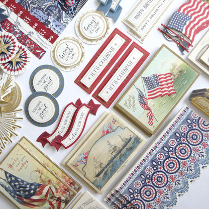 The Patriotic Papercrafting Kit with Dies includes vintage-style cards, banners, and decorations featuring American flags, ships, and red, white, and blue designs—perfect for Americana crafts or use with your favorite dies.