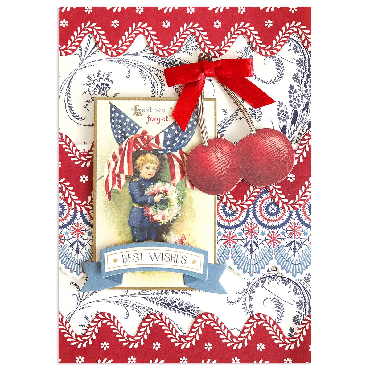 Vintage-inspired greeting card featuring a child with a wreath, "Best Wishes" banner, flags, cherries, and a red-blue border—ideal for the Patriotic Papercrafting Kit with Dies or other Americana-themed projects.