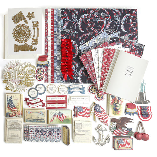The Patriotic Papercrafting Kit with Dies includes Americana-themed papers, stickers, cards, ribbons, and embellishments featuring flags, eagles, and red-white-blue designs—perfect for patriotic scrapbooking projects.