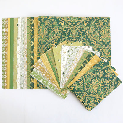 The Lucky for All Double Sided Cardstock, featuring green and gold foil patterns, is fanned out on a white background.
