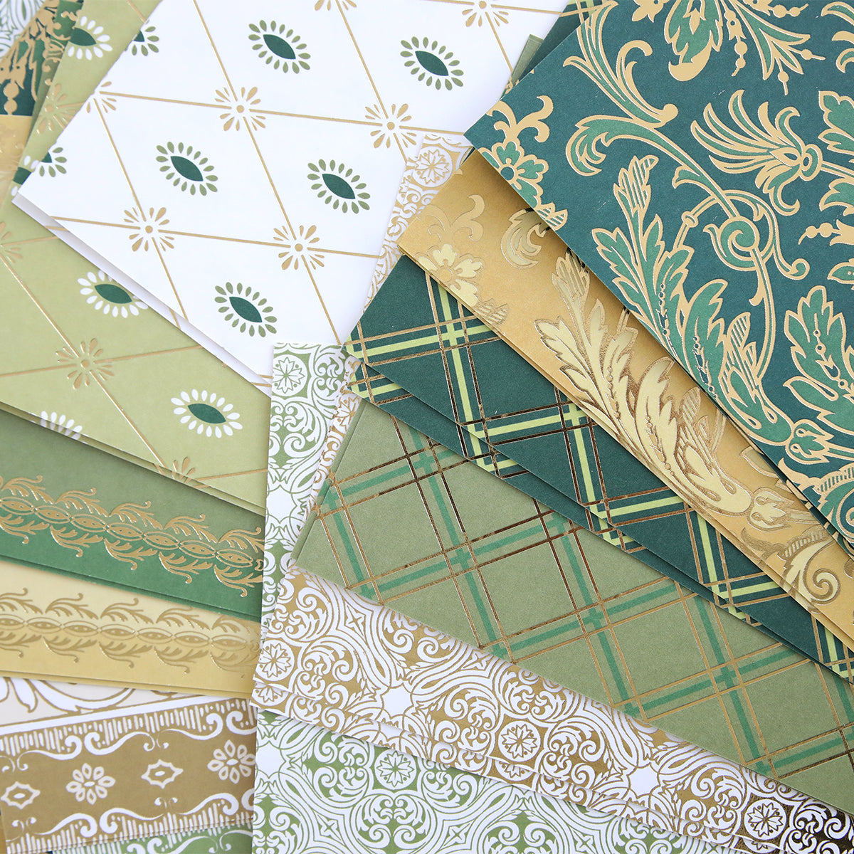 Lucky for All Double Sided Cardstock features green, gold, and white decorative paper in floral, geometric, and ornate patterns—some with gold foil accents—beautifully arranged in an overlapping style.