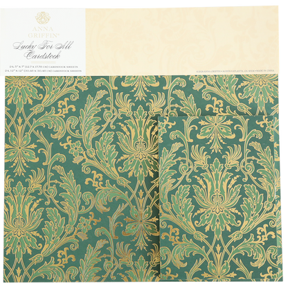 Lucky for All Double Sided Cardstock features intricate gold foil floral and botanical patterns on green sheets, packaged under the label “Anna Griffin, Lucky For All, Cardstock.” Ideal for elegant scrapbook paper projects.