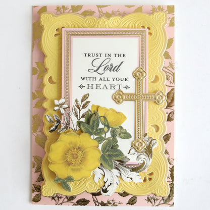 Prayer Sentiment Rub On Transfers feature a gold and yellow floral border, raised yellow flower and cross, plus "Trust in the Lord with all your heart" text on a pink and gold background—ideal for encouragement or sympathy cards.