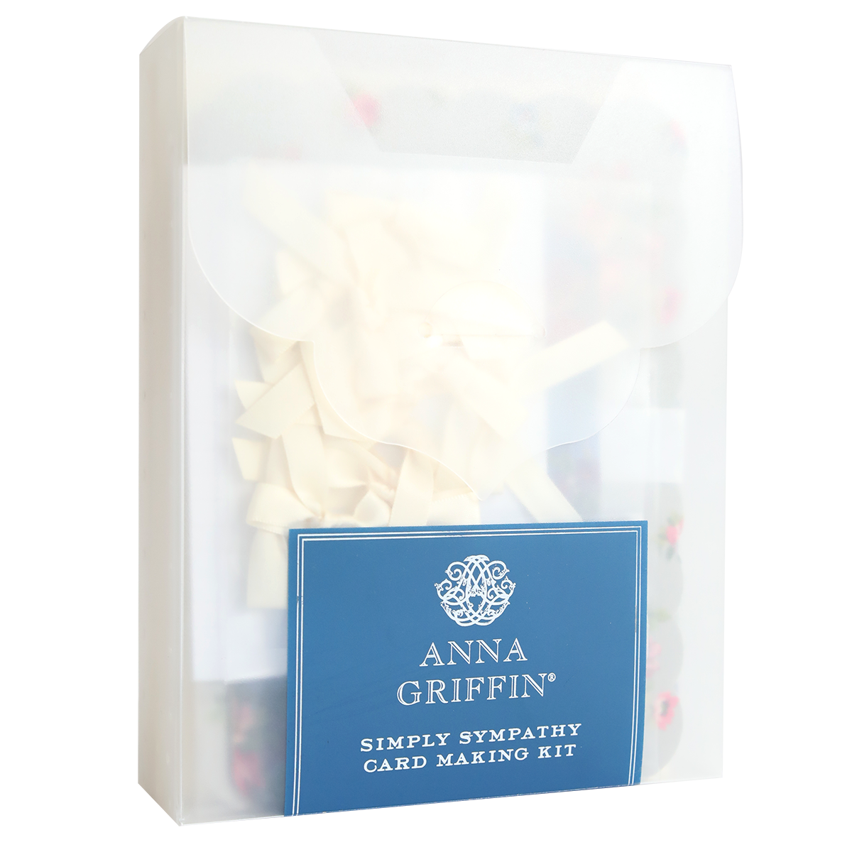 A transparent box labeled "Simply Sympathy Card Making Kit," containing cream-colored ribbons and card making supplies for creating elegant handmade sympathy cards.
