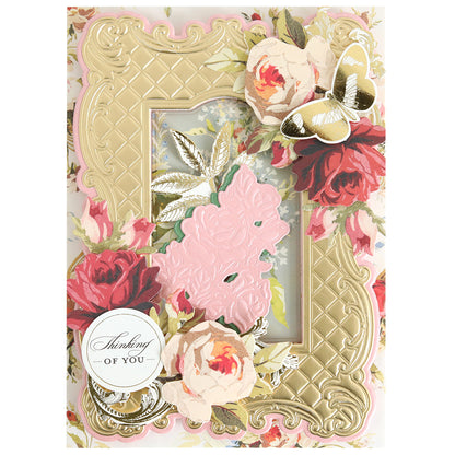 A decorative card showcases gold embossing, pink and red roses made with the Tufted Rose Concentric Frames 3D Die Set, a gold and white butterfly, and a round "Thinking of You" label.