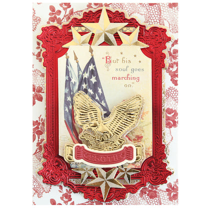 Create a patriotic card with the Pretty Patriotic 3D Frame Die Set featuring a gold eagle, stars, American flags, “But his soul goes marching on” text, and a floral border for striking red and gold paper crafts.