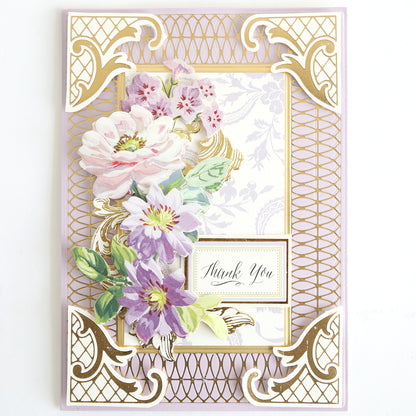 A decorative thank you card made from Ivory Coated Cardstock (260 gsm), with gold foil geometric borders, pastel flowers, and a central "Thank You" message.