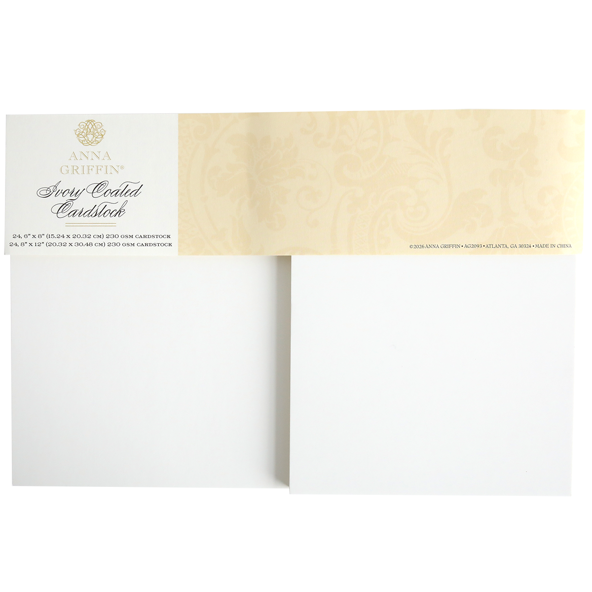 A photo of Ivory Coated Cardstock, showing a pack with two blank 260 gsm sheets and a beige decorative label with gold text at the top.