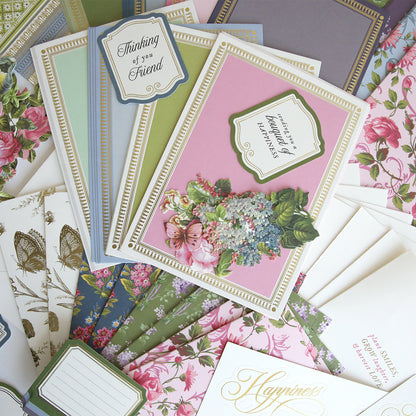 The In The Garden Ultimate Paper Crafting Kit includes an array of floral-themed greeting cards and envelopes with assorted designs and colors—ideal for cardmaking or enhancing your next papercrafting project.