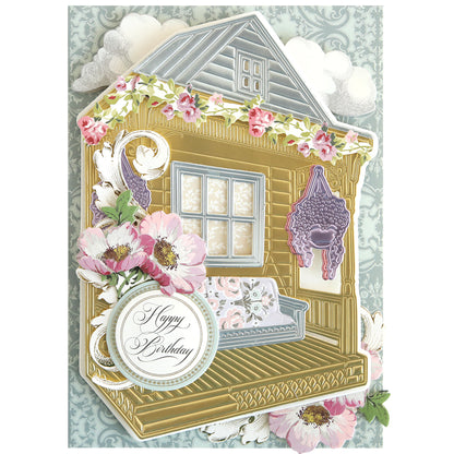 Illustration of a porch with a swing, flowers, and "Happy Birthday" in cursive on a round sign—ideal for handmade cards crafted with Front Porch Scene Dies for dimensional effects.