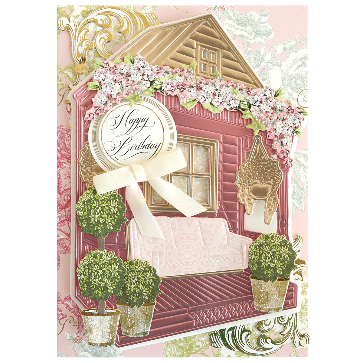 The Front Porch Scene Dies are perfect for creating handmade birthday cards with a pink house, white sofa, potted plants, hanging basket, and floral decorations. Add dimensional "Happy Birthday" designs with this versatile die set.