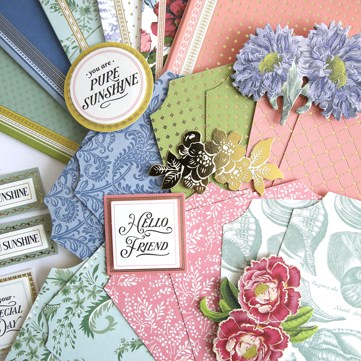 The Simply Summer Card Making Kit includes assorted decorative stationery with floral patterns, envelopes, and handmade cards featuring messages such as "Hello Friend" and "You are Pure Sunshine.