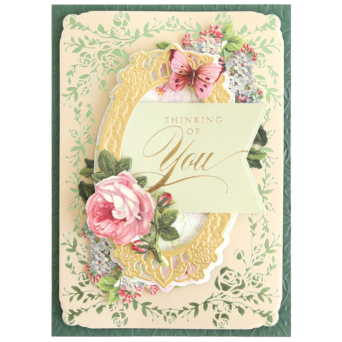 A handmade card featuring a floral border and "Thinking of You" in gold script, crafted on the front with Gilded Rose Frame and Sentiment Hot Foil Plates.
