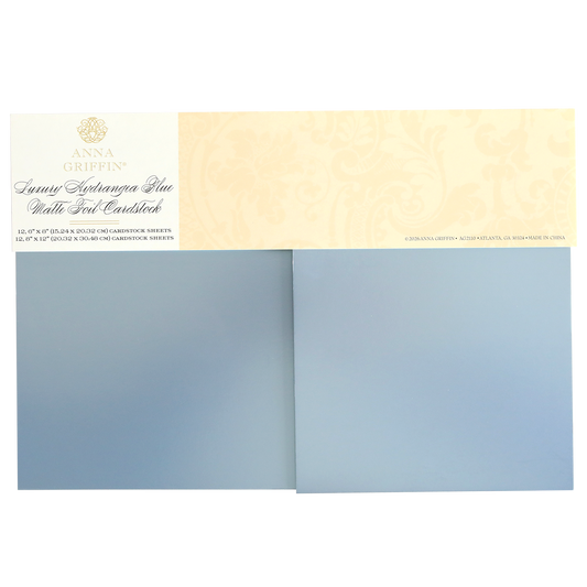 Two sheets of hydrangea blue matte foil cardstock are displayed below a cream-colored label reading "Luxury Hydrangea Blue Matte Foil Cardstock.