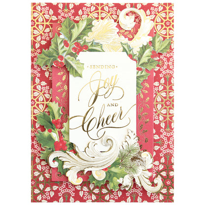 The Christmas Grace Card Making Kit features a festive card with gold and white "Sending Joy and Cheer" text, surrounded by holly, pine, and ornate designs—perfect inspiration for your handmade Christmas cards.