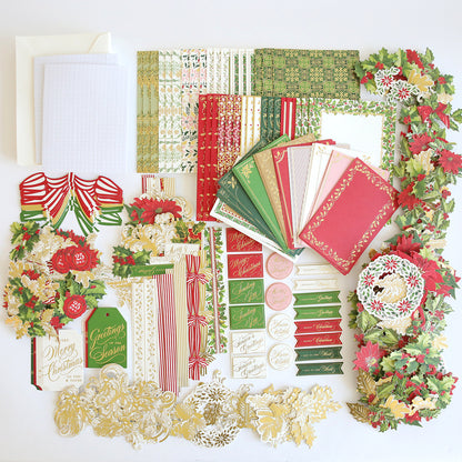 The Christmas Grace Card Making Kit offers patterned papers, envelopes, tags, cutouts, bows, and festive floral embellishments—perfect for creating handmade holiday cards or enhancing your Christmas card kit.