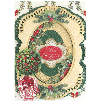 The Christmas Grace 3D Concentric Die Set creates ornate cream and green borders with holly and berries, perfect for cards or scrapbooks, and features a central "Merry Christmas" label in elegant script.
