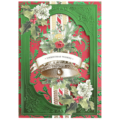 The Christmas Grace Tonal Foil Card Stock features green and gold foil accents, holly leaves, a bell, and "Christmas Wishes" on a red patterned background—ideal for festive card making or crafts with embossed cardstock details.