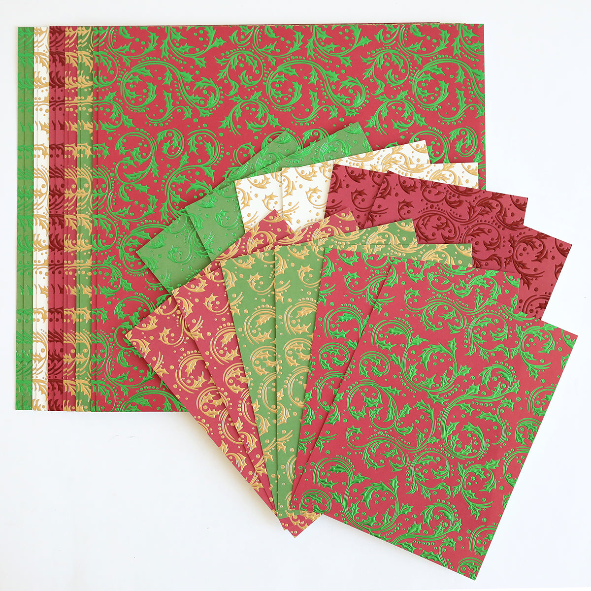 Christmas Grace Tonal Foil Card Stock in red, green, and gold with elegant gold patterns—perfect for holiday card making—is beautifully displayed on a flat surface.