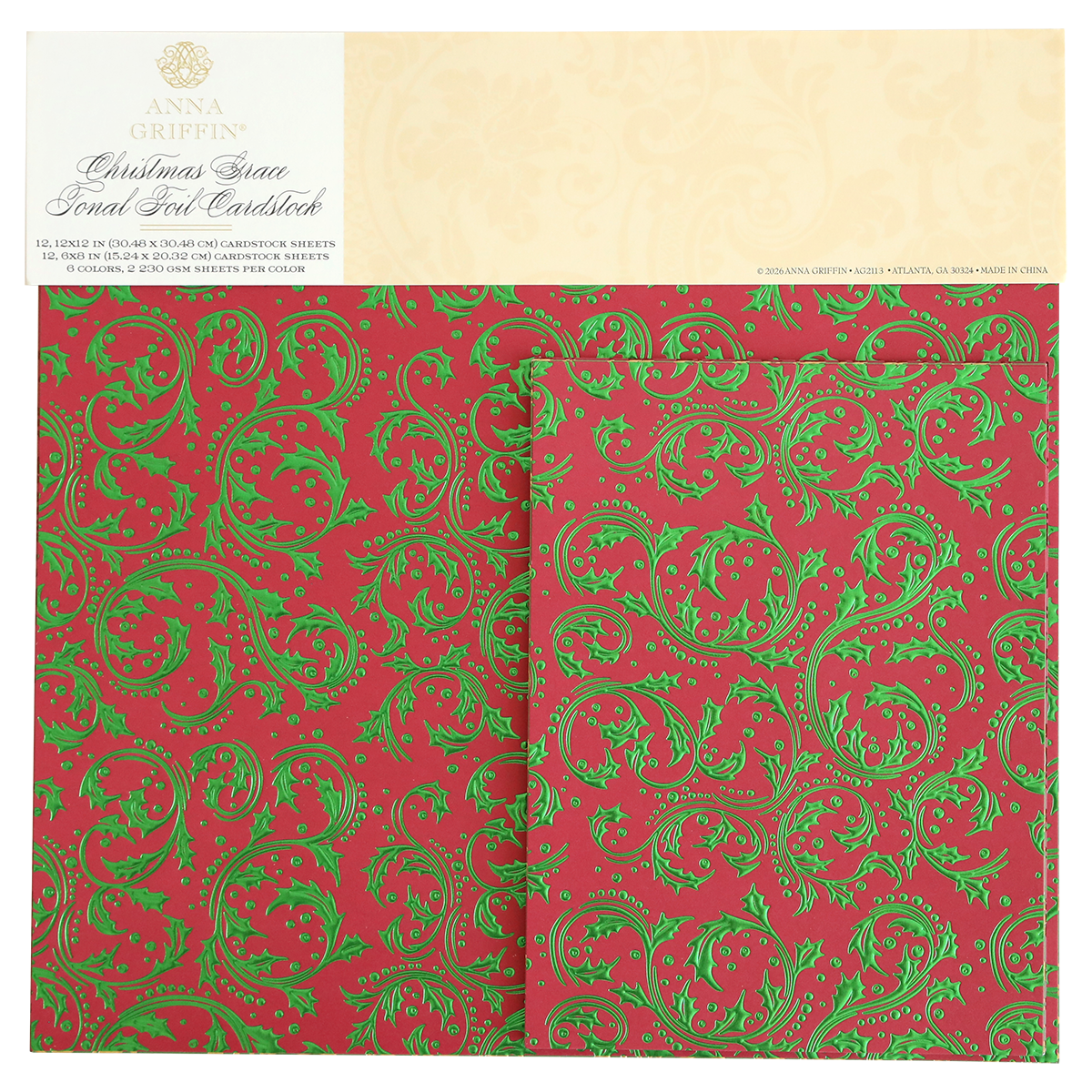 Christmas Grace Tonal Foil Card Stock features red sheets with green ornate scroll and holly designs, perfect for holiday card making and Christmas crafting projects. This embossed cardstock is from the Anna Griffin brand.