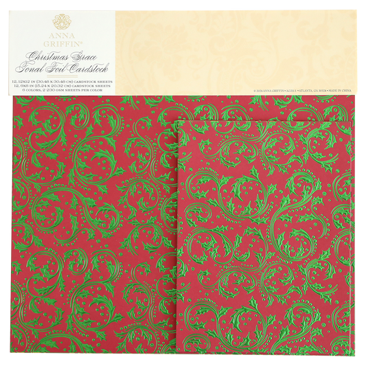 Christmas Grace Tonal Foil Card Stock features red sheets with green ornate scroll and holly designs, perfect for holiday card making and Christmas crafting projects. This embossed cardstock is from the Anna Griffin brand.