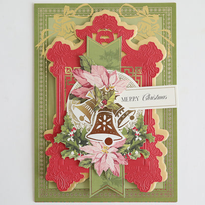 The Holiday Nostalgia Foil Rub Ons add vintage shimmer to ornate Christmas cards with layered red, gold, and green designs featuring poinsettias, holly, golden bells, and a “Merry Christmas” message—perfect for papercrafting.
