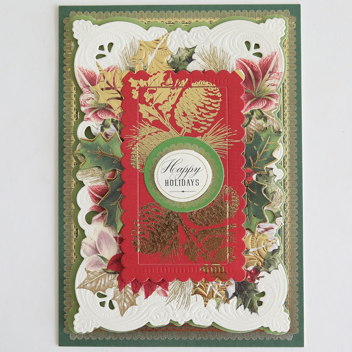 Create festive cards with Holiday Nostalgia Foil Rub Ons, featuring layered floral and foliage designs, vintage shimmer accents, and a "Happy Holidays" greeting—ideal for Christmas papercrafting.