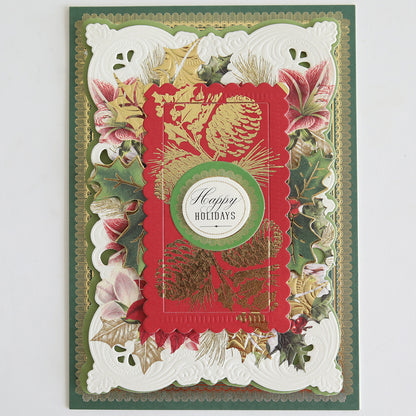 Create festive cards with Holiday Nostalgia Foil Rub Ons, featuring layered floral and foliage designs, vintage shimmer accents, and a "Happy Holidays" greeting—ideal for Christmas papercrafting.