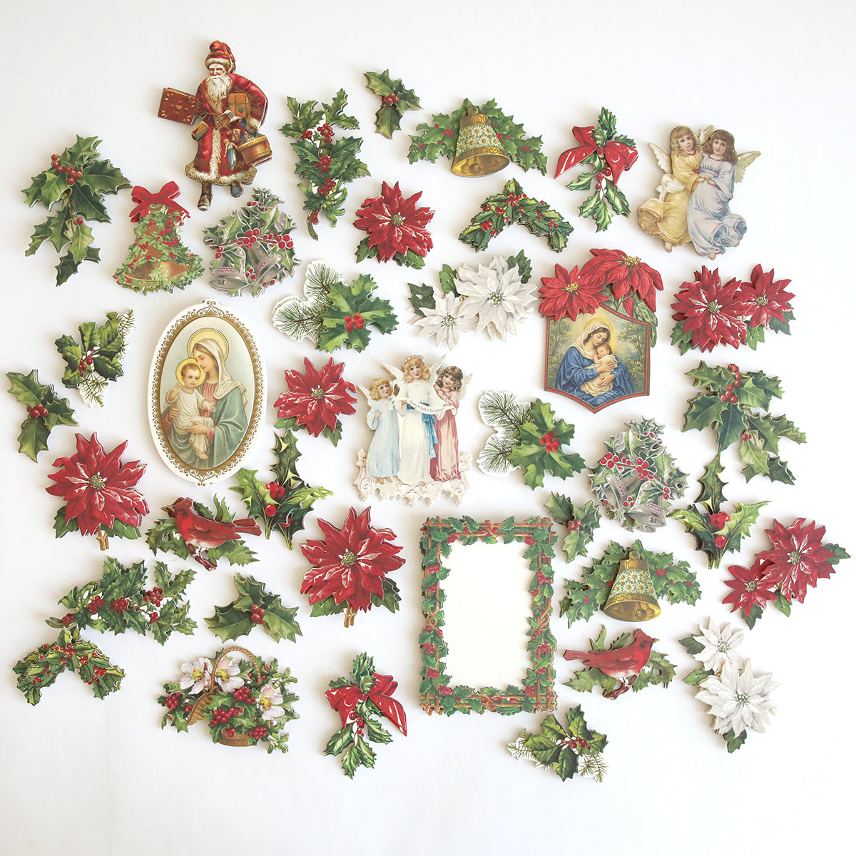 Holiday Nostalgia Embellishments feature vintage-inspired Christmas icons—holly leaves, poinsettias, bells, angels, and framed holiday images—perfect for adding festive charm to your paper crafts.