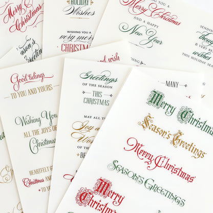 Add festive cheer to your holiday projects with Christmas Card Sentiment Rub Ons, featuring elegant red and green calligraphy greetings like "Merry Christmas" and "Season’s Greetings"—ideal for handmade cards or bringing a special touch to any holiday paper craft.