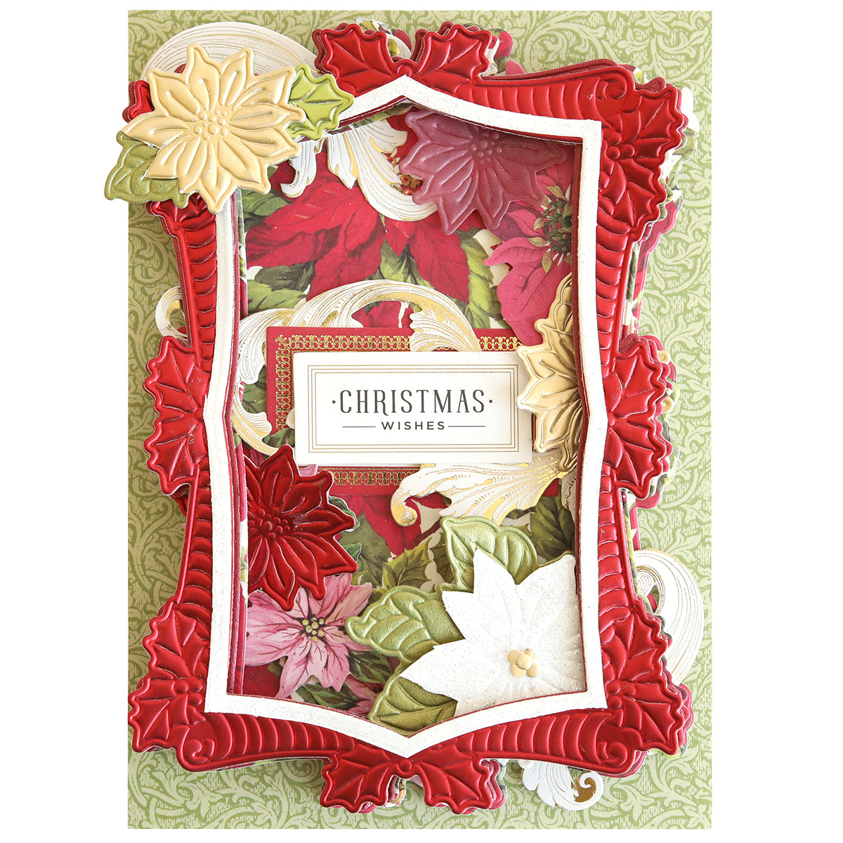 A festive Christmas card featuring a red and gold embossed frame, floral designs made with Poinsettia Scroll Frame 3D Dies, and a central "Christmas Wishes" label on a green patterned background.