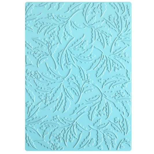 A blue rectangular mat featuring an embossed, swirling pattern of leaves and berries, inspired by a classic Christmas Holly motif—ideal for crafting elegant foiled backgrounds with the Gilded Christmas Holly Hot Foil Plate.