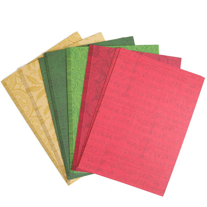 Five sheets of Holiday Color Drenched Cardstock in vibrant red, green, and yellow are elegantly fanned out on a white background. Perfect for Christmas card making, this double-sided cardstock adds festive flair to your seasonal creations.