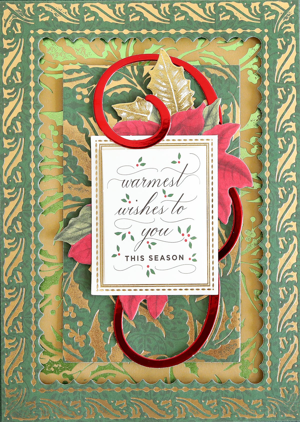 A decorative holiday card featuring green and gold patterns, red accents, and the message "Warmest wishes to you this season" surrounded by poinsettias and gold leaves—perfect inspiration for Christmas card making or for pairing with your favorite paper from the Holiday Cardstock Bundle.