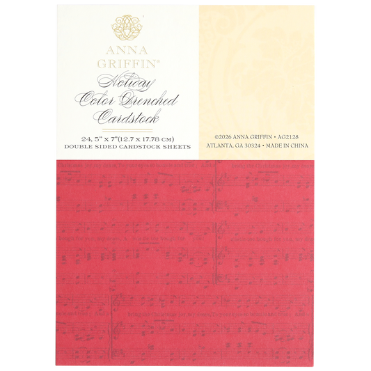 Red Holiday Color Drenched Cardstock sheet featuring subtle music note designs; this double-sided cardstock is ideal for Christmas card making. Product details and company information are displayed at the top of the packaging.