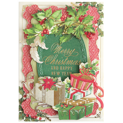 A festive Christmas card adorned with holly and gifts, featuring the message "Merry Christmas and Happy New Year" in shimmering gold script—perfect for adding a touch of handmade crafting magic. Created using the Gilded Small Sentiments Foil Plates Bundle, this card sparkles with elegance and holiday cheer.