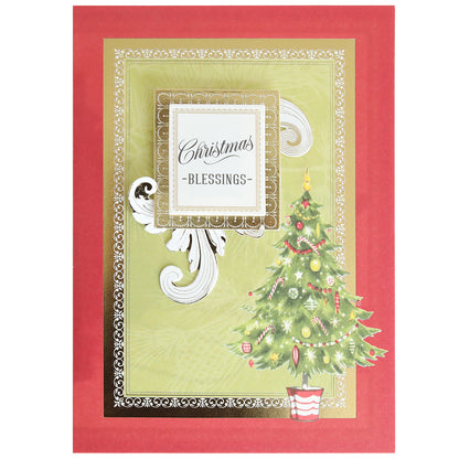 Add a personal touch to your holiday greetings with this handmade Christmas card, showcasing a decorated tree and the message “Christmas Blessings” on a gold and green background with a red border. Perfect for pairing with the Folded Christmas Tree Card Making Kit or any holiday card kit.