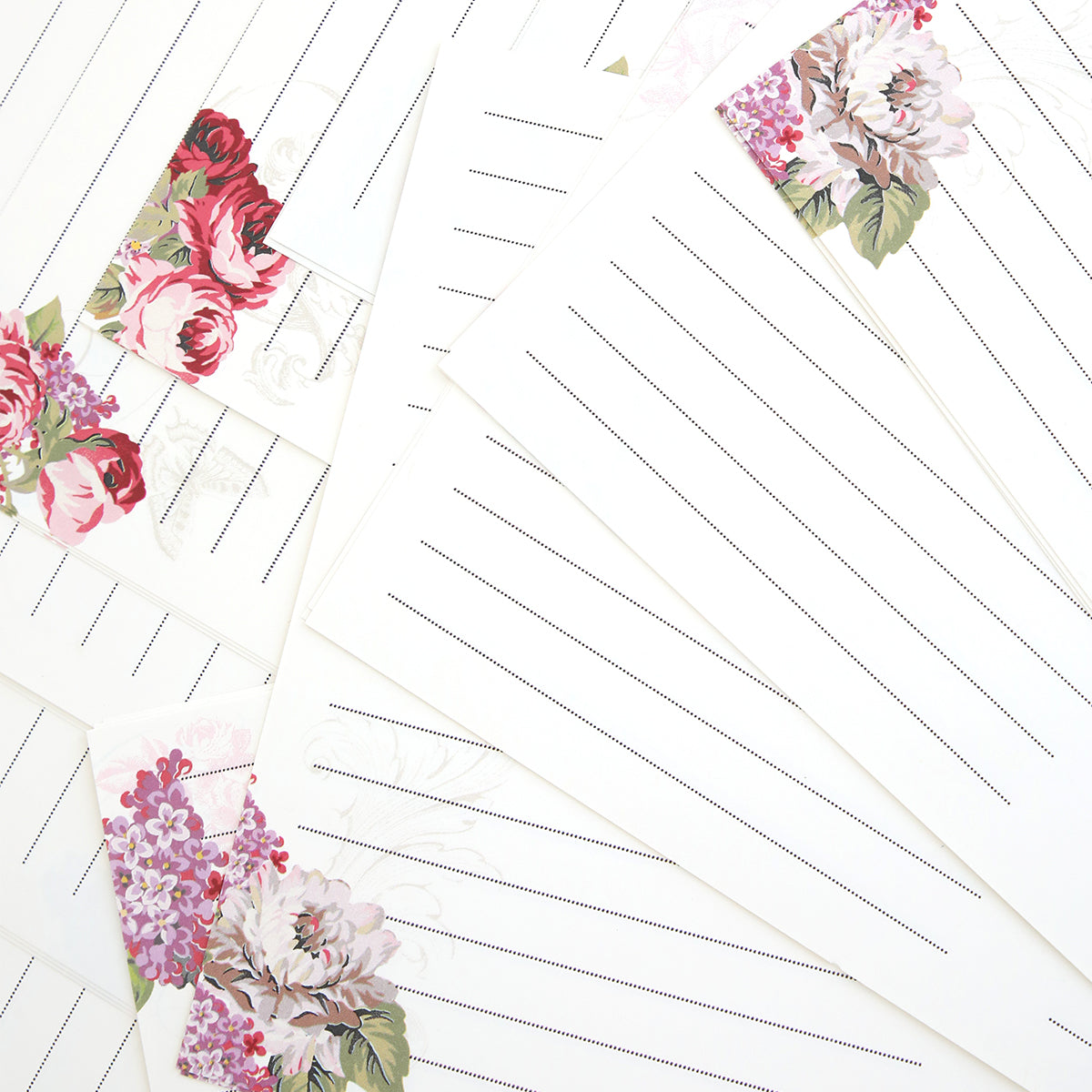 Gratitude Journal Pages: Pre-printed lined stationery with pink and red floral corners on a white background—ideal for gratitude journals or as pretty journal insert pages.