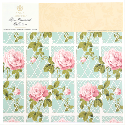 Double-sided cardstock with large pink roses and green leaves on a light blue, white trellis background. Ideal for paper crafts or scrapbooking. Features "Rose Cardstock Collection" branding at the top.