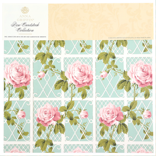 Double-sided cardstock with large pink roses and green leaves on a light blue, white trellis background. Ideal for paper crafts or scrapbooking. Features "Rose Cardstock Collection" branding at the top.