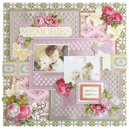 Scrapbook page with “Memories” text, floral decorations, and two photos of a child with a white dog, set on patterned pink and lavender backgrounds from the Charlie Double Sided 12x12 Cardstock Collection—perfect for creating layered paper crafts in a 12″ x 12″ format.