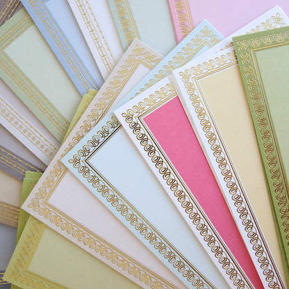 Timeless Photo Mats and Card Layers feature ornate, pastel-colored papers with gold borders, displayed overlapping—ideal for scrapbook pages or adding a touch of elegance to cards.