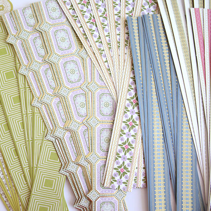 Timeless Border Stickers feature assorted decorative patterned strips in green, pink, blue, and gold. Perfect for scrapbook supplies or adding unique borders to crafts.