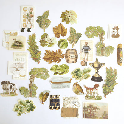 Jack Double Sided Cardstock and Embellishments features a variety of vintage-style die cut designs—including leaves, animals, trophies, sports figures, binoculars, and nature-themed illustrations—beautifully arranged on a white background. Perfect for enhancing scrapbook pages or creative projects with its double sided cardstock and coordinating embellishments.