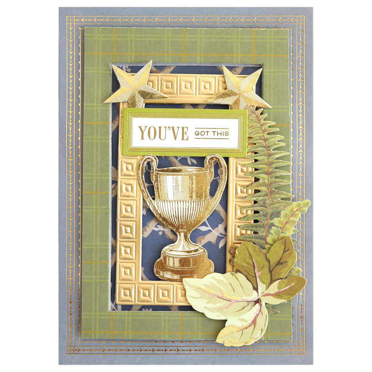Introducing the Jack Double Sided Cardstock and Embellishments—a stunning greeting card design featuring a gold trophy, stars, fern leaves, and the uplifting text “YOU’VE GOT THIS” set against a vibrant green and plaid background with gold stitching and layered accents. Ideal for use as double sided cardstock or for enhancing your scrapbook pages with coordinating die cut embellishments.